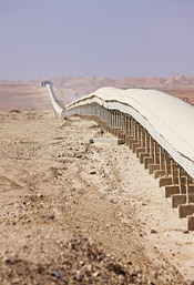 The Bou Craa mine in the Western Sahara sends phosphate down a 150-kilometer-long conveyor belt to the port of El Ayoun.
